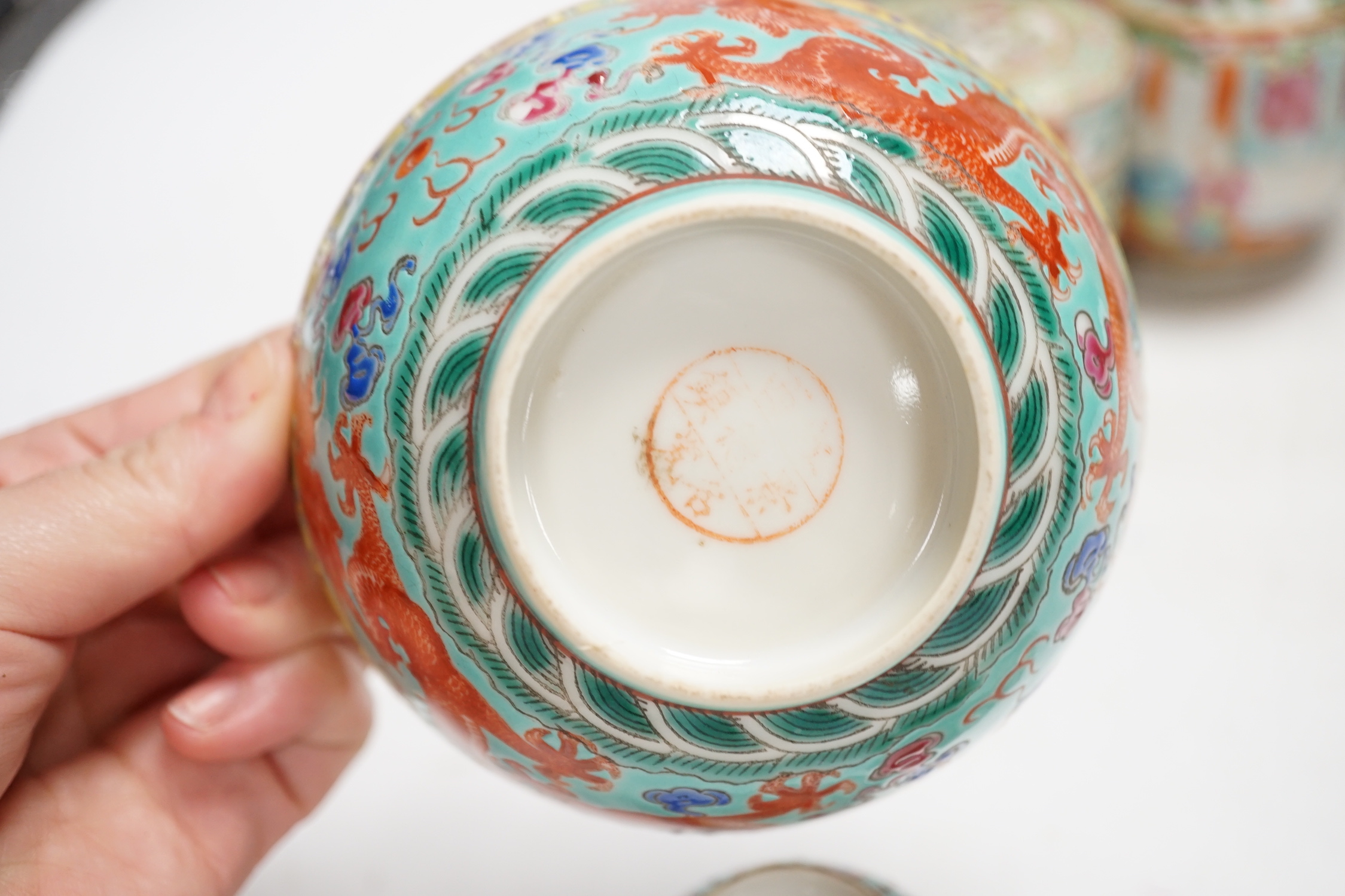 A group of Chinese ceramics 18th century and later, including a bottle vase, a water pipe vessel, box and cover, three bowls, a Tang style figure of a lady, a Yixing teapot, together with a resin figure of an emperor